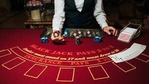 Tampilan layar Dragon Tiger Live dengan dealer profesional di studio kasino kuningtoto
